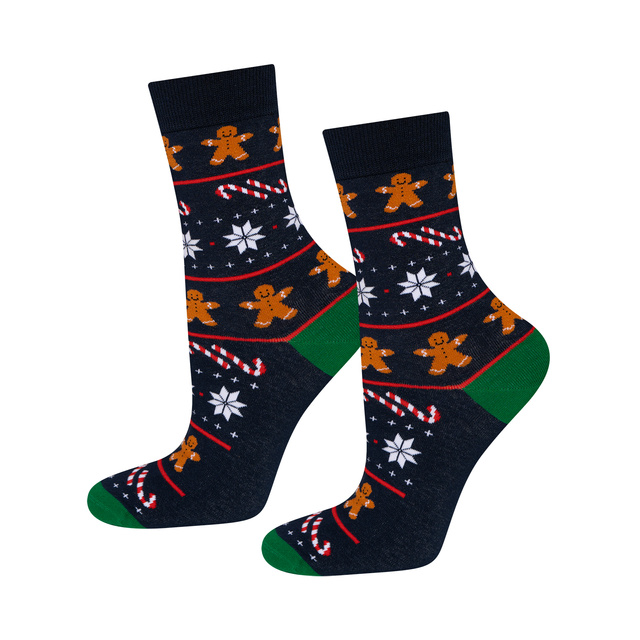 Calcetines con muñeco de jengibre en tarjeta navideña