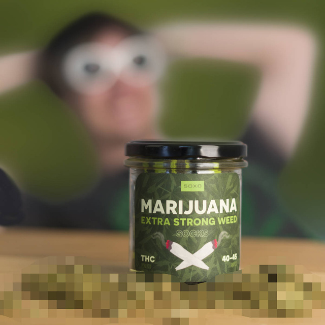 Calcetines coloridos de SOXO GOOD STUFF marijuana en un frasco de algodón